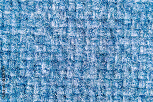 Light Blue or baby blue knitwear texture background, soft natural wool texture, knitted fabric.