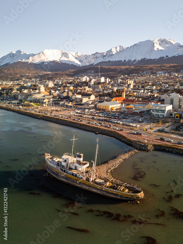 Wallpaper Mural Ushuaia City, End of the World, with snow-capped mountains in the background Torontodigital.ca