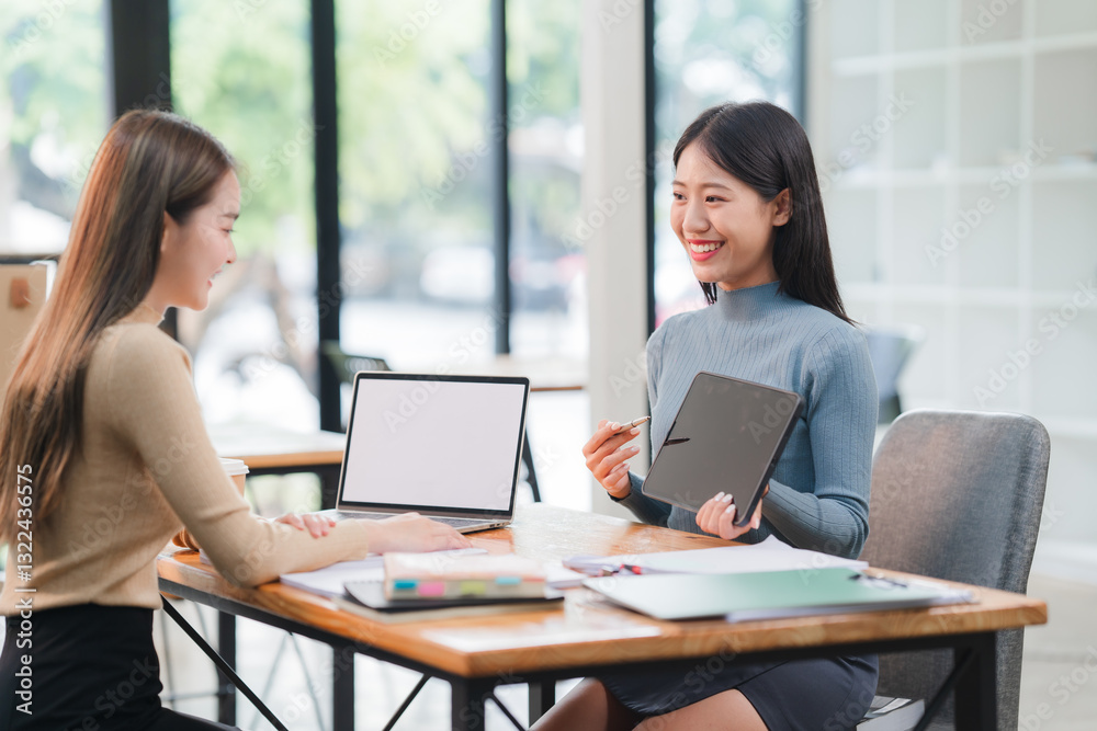 Two Young Women in Business Meeting at Office Two Young Women in Business Meeting at Office