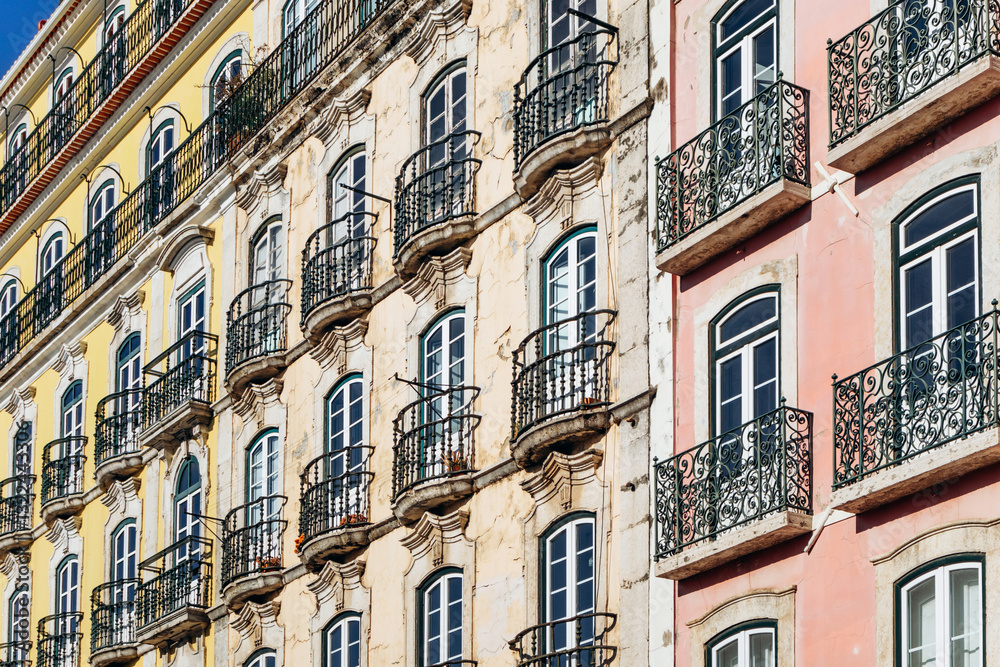 The facade of an old building in central Lisbon, showcasing historic charm and architectural details The facade of an old building in central Lisbon, showcasing historic charm and architectural details