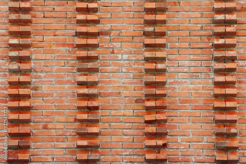 Fotografie Exterior brick wall with protruding bricks at intervals pattern background