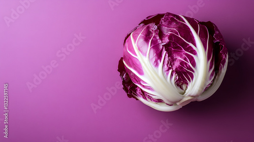 Chicory radicchio a purple background with copy space. photo