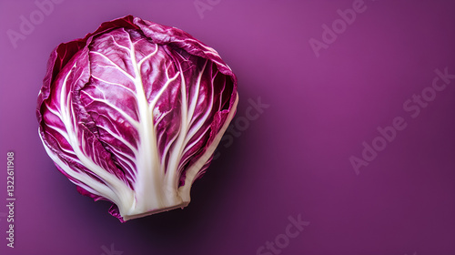 Chicory radicchio a purple background with copy space. photo