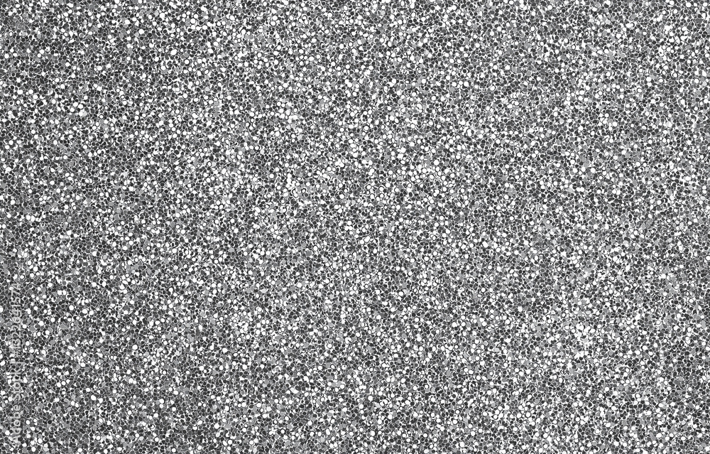 Fototapeta premium Silver glitter texture background with a shiny and sparkling effect, blending white and grey tones. The glittery surface creates a glamorous, textured background ideal for creative design projects.