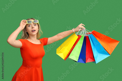 Young woman in sunglasses w...