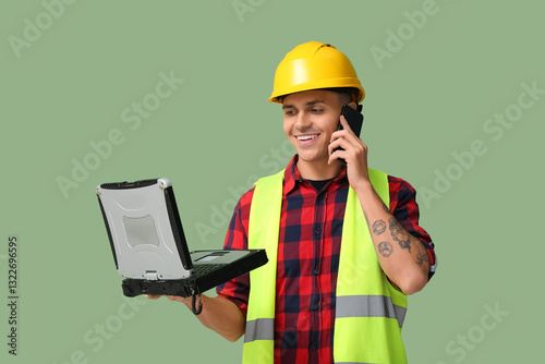 Young male engineer with la...