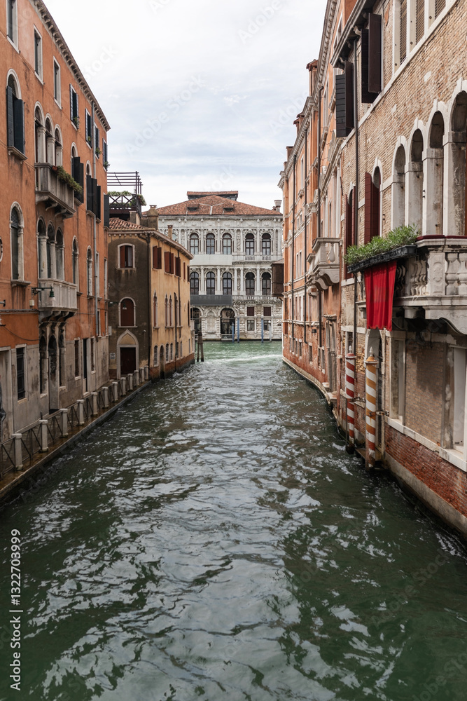 Venice canal without boats and on the sides are historical buildings Venice canal without boats and on the sides are historical buildings