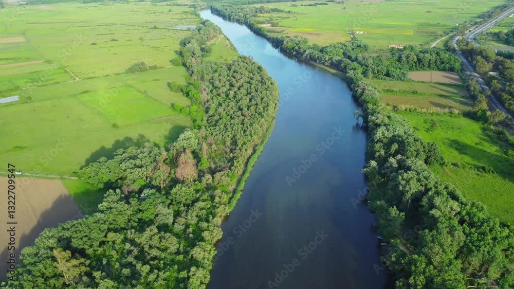 Aerial View of  river, Beautiful Aerial View of African Jungles forest and River, Landscape in aerial drone shot. Adove calm tranquil river in Jijel Algeria North Africa, River and green fores trees.