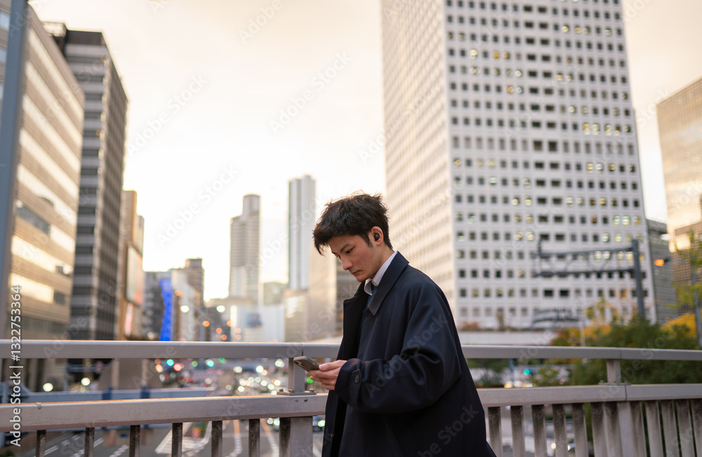 Businessman Using Cellphone While Walking In The City Businessman Using Cellphone While Walking In The City