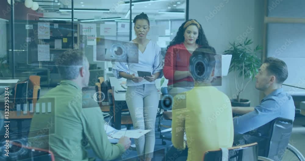 Diverse team collaborating in modern office with digital data overlay animation Diverse team collaborating in modern office with digital data overlay animation