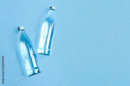 Glass bottles of clean wate...