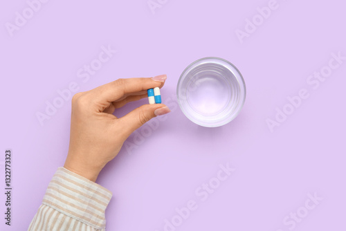 Female hand with pills and ...