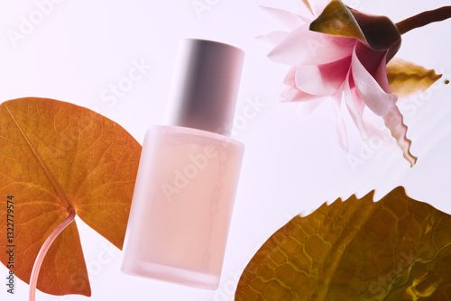 Elegant skincare product displayed with nature elements