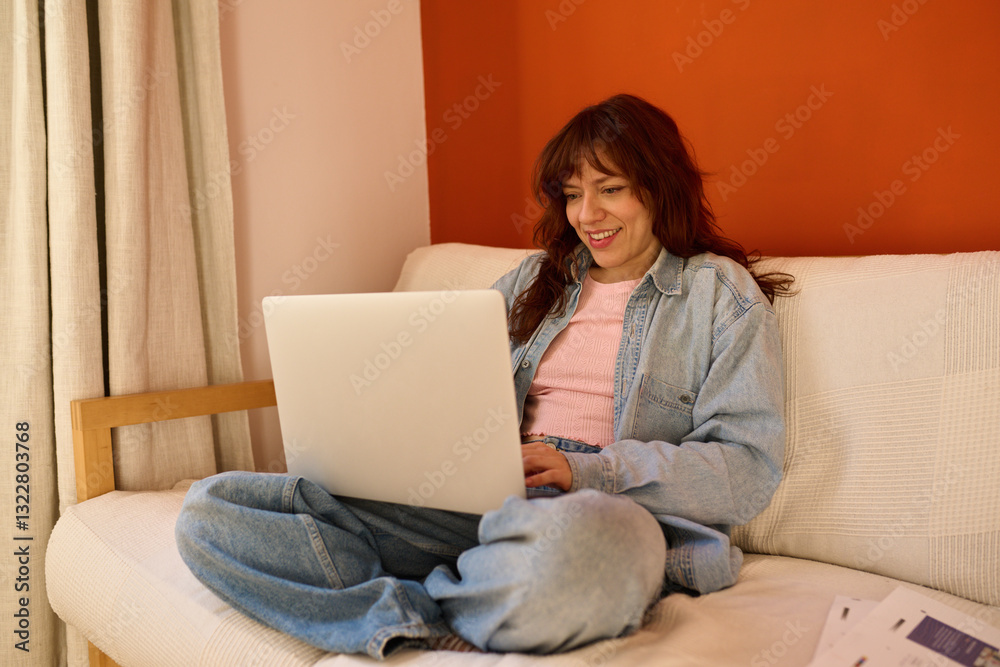 Working Freelancer on a Cozy Couch at Home Working Freelancer on a Cozy Couch at Home