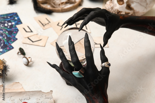 Bloody black witch hands wi...