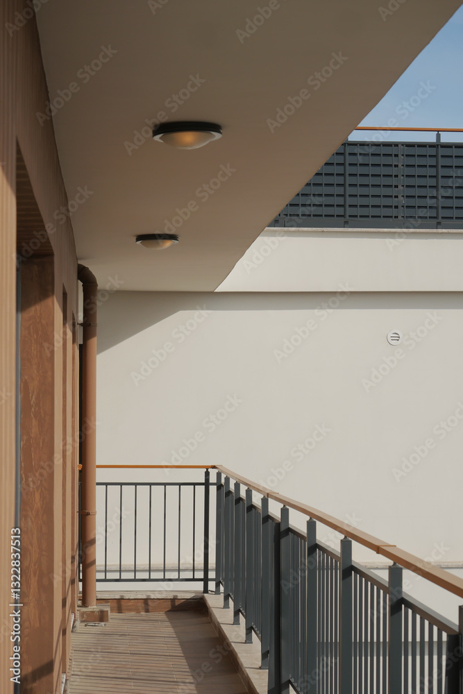Fototapeta premium Modern balcony design with minimalist architecture during daytime