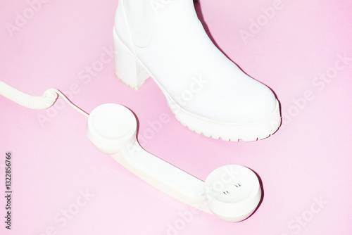 Not answering a phone call: stepping on landline phone to decline  photo