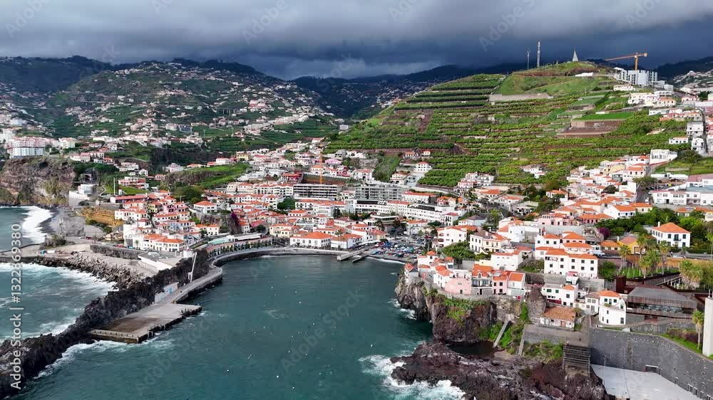 Panoramic Drone Footage of Camara de Lobos, Madeira, Coastal Town and Terraced Hills, Portugal