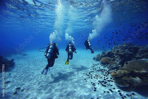 Underwater Exploration of Coral Reefs with Scuba Divers Amidst Clear Blue Ocean Waters