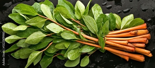 Fresh Green Leaves with Water Droplets on Dark Surface, Natural and Healthy Ingredients Display