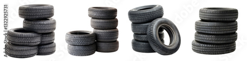 Stacked piles of discarded rubber tires on a concrete floor in a workshop or garage setting showcasing the concept of recycling and reusing automotive materials for sustainability