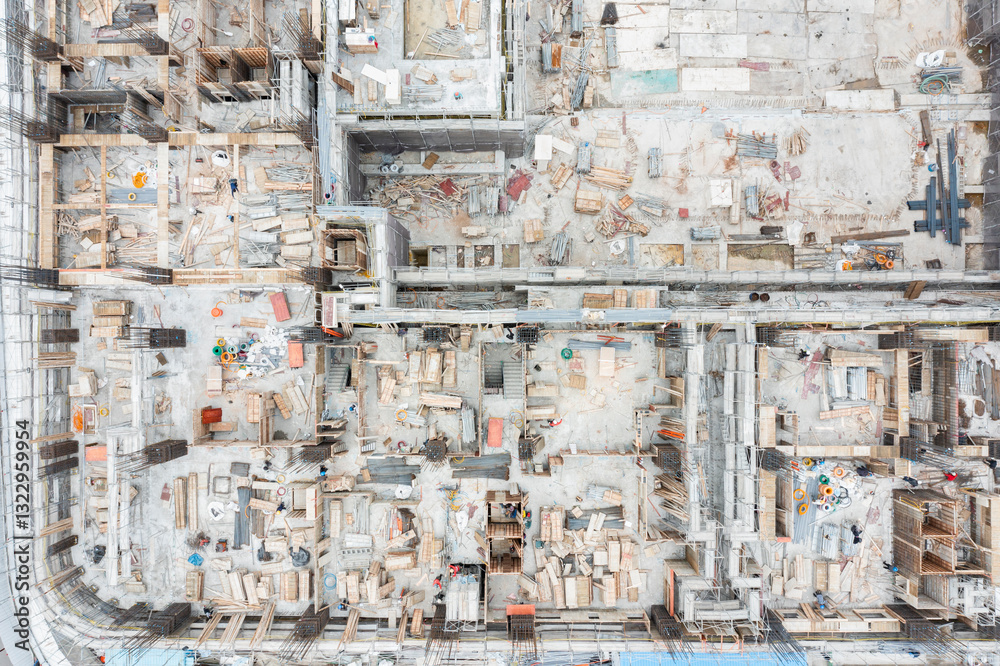 Aerial View of a Busy Construction Site with Workers Aerial View of a Busy Construction Site with Workers
