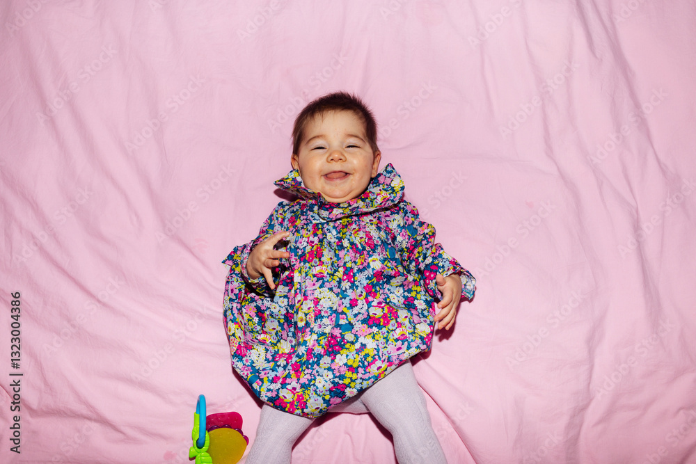 Portrait of baby on pink blanket background Portrait of baby on pink blanket background