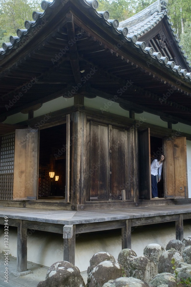 Fun at Traditional Japanese architecture in serene forest near Kyoto Fun at Traditional Japanese architecture in serene forest near Kyoto