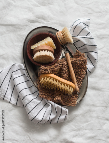 Wallpaper Mural Kitchen cleaning accessories - homemade soap, brushes, napkins on a metal tray on a light background, top view Torontodigital.ca