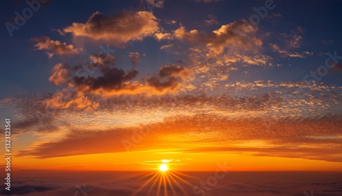 background panorama scenic of the strong sunrise with silver lining and cloud on the orange sky