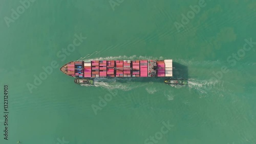 Aerial top view container ship transportation container for business logistics, export import or freight transportation.