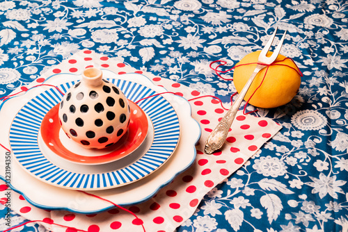 Still life with lemon and plates.