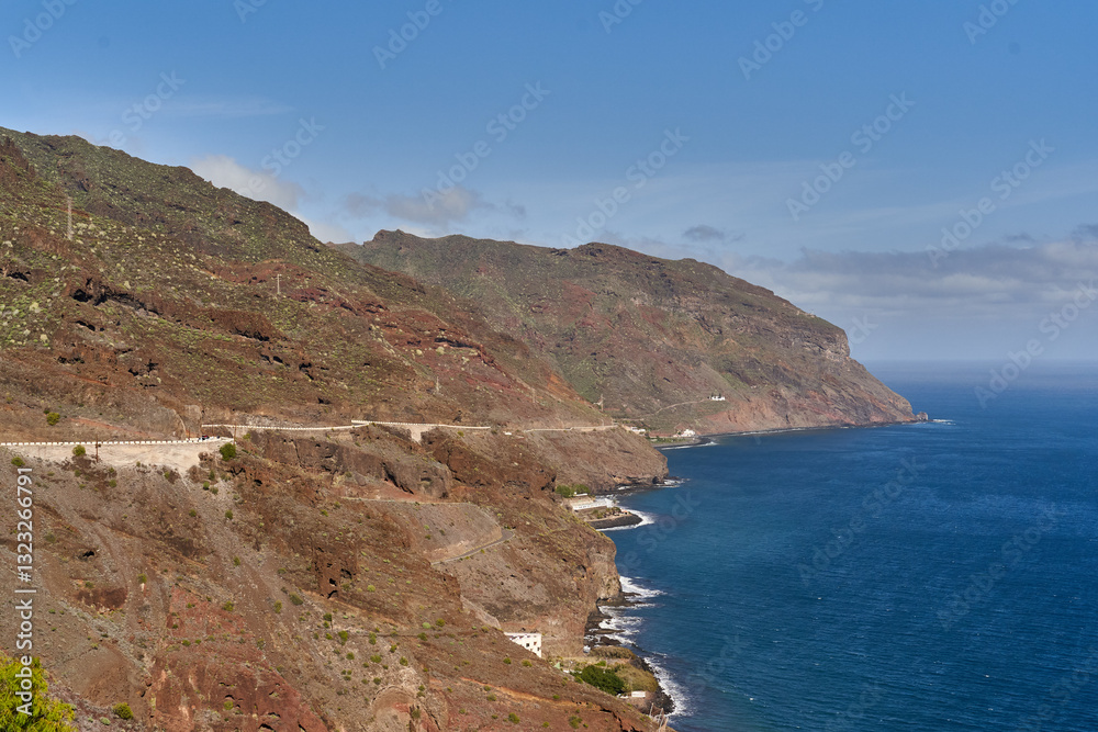 Scenic coastal road along cliffs in Tenerife........ Scenic coastal road along cliffs in Tenerife........
