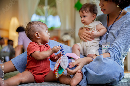 Two babies recognizing each other photo