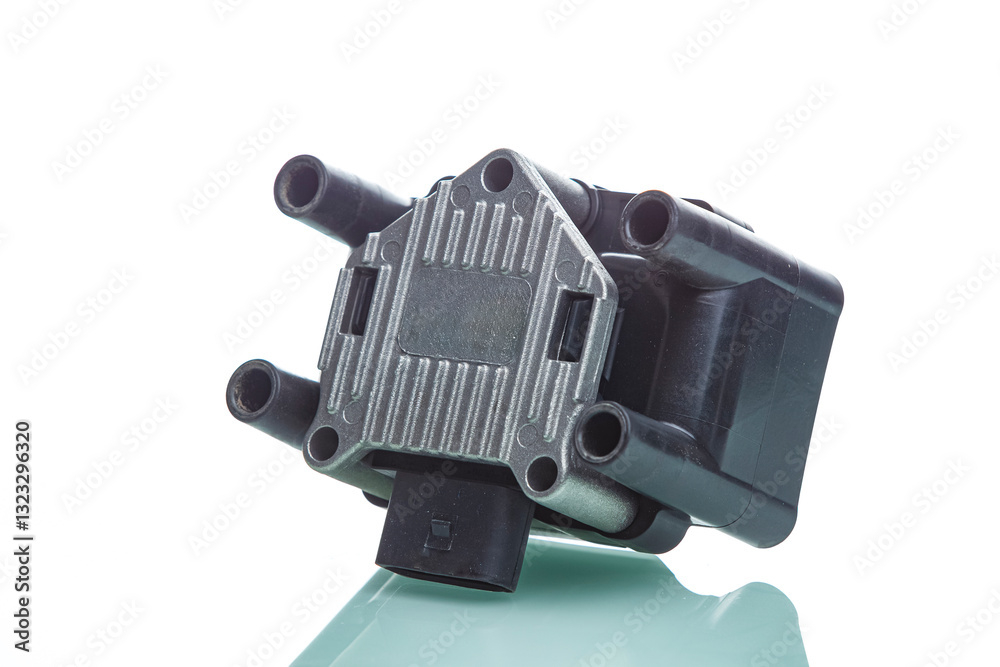 Automotive Repairing Concepts. Set of New Car Ignition Coil Placed Over Pure White Background Automotive Repairing Concepts. Set of New Car Ignition Coil Placed Over Pure White Background