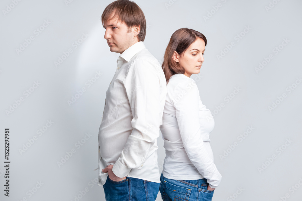 Relationships Concepts. Sad Caucasian Couple Trying to Solve Relationships Problems While Standing Together Back to Back With Depressed Feelings.