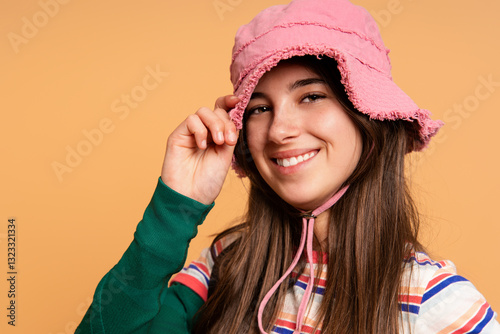 Smiling Girl in Pink Hat photo