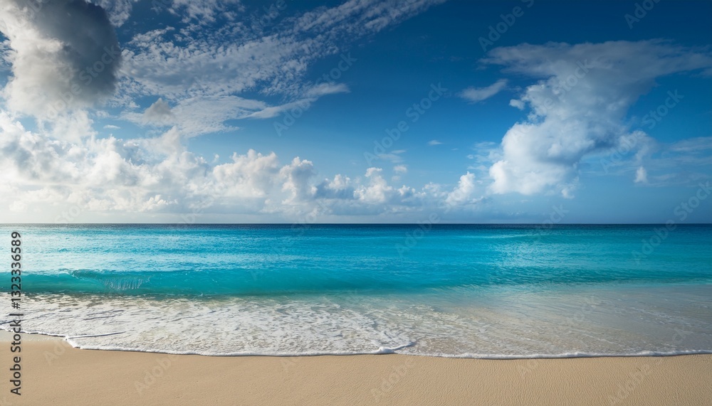 Fototapeta premium cobalt sea softly laps at a sandy shore beneath a tranquil cloud filled sky
