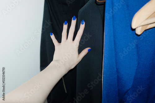 Selecting which clothes items to wear from the garderobe wardrobe  