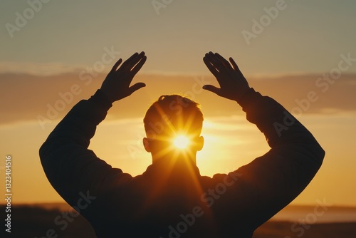 A person with their hands raised in a gesture of surrender or defeat photo