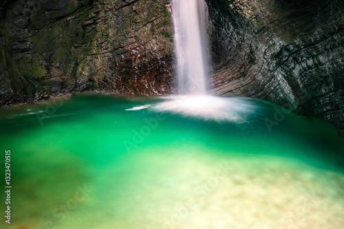 Immersion in the greenery. Kobarid natural waterfalls of Kozjak. Wonder of nature