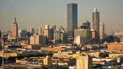 Aerial view of cityscape during hot summer evening time. Slow and cinematic camera movement
