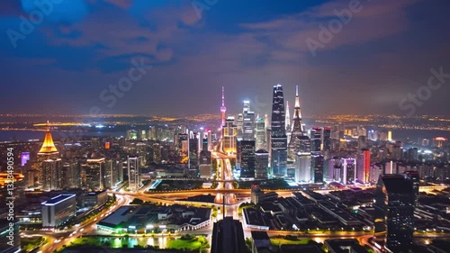 Aerial view of cityscape during hot summer night. Slow and cinematic camera movement