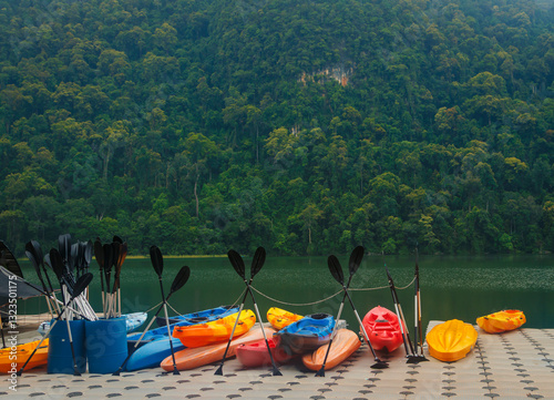 Kayaks in the blue lagoon ocean sea in Malaysia waiting the tourists.