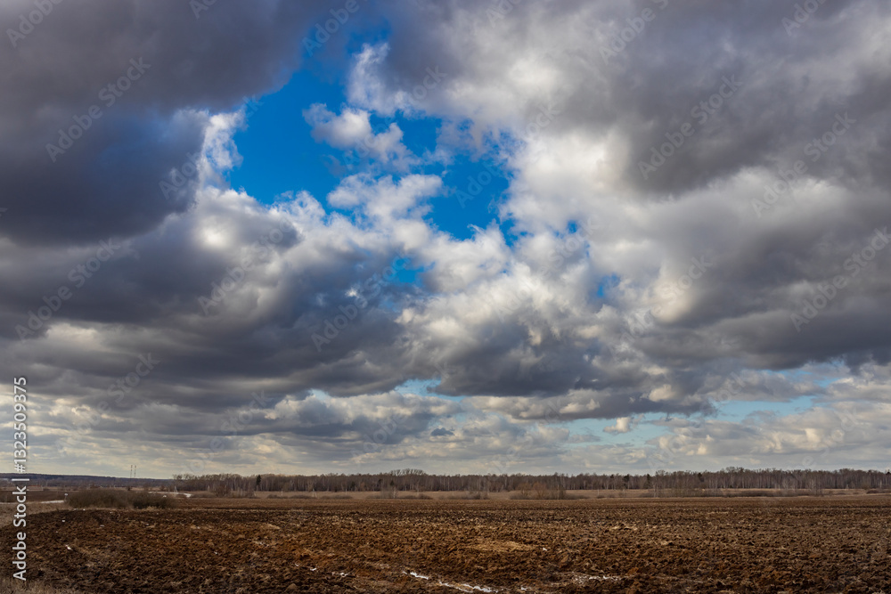 storm clouds over the field storm clouds over the field