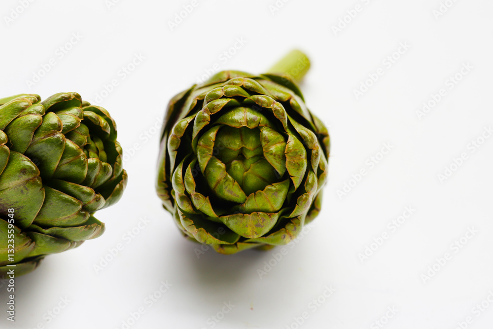 Fototapeta premium Purple artichoke on white background.