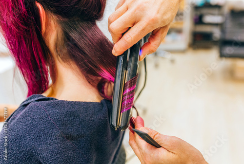 Hair straightening close-up