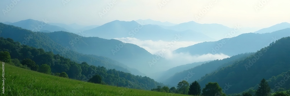 Obraz premium Rolling hills and mountains covered in a thick layer of fog, fog, peaceful, atmospheric