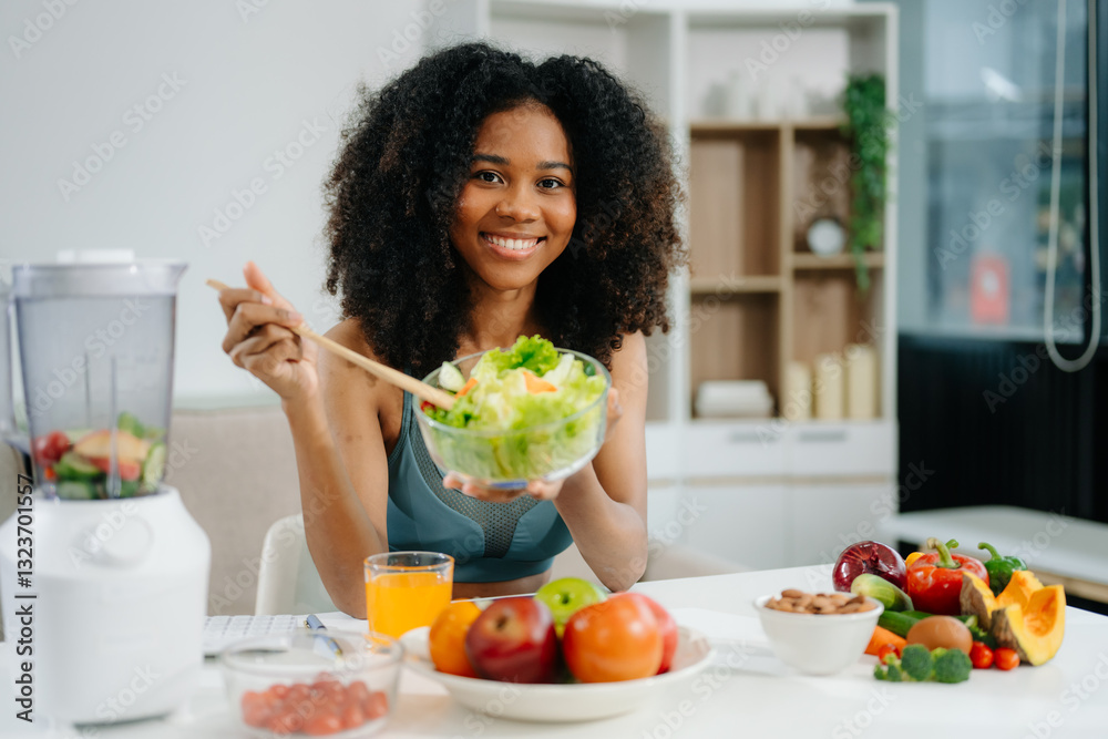 Smiling woman in a modern kitchen with fresh fruits, vegetables, blender, and orange juice, promoting clean eating, wellness Smiling woman in a modern kitchen with fresh fruits, vegetables, blender, and orange juice, promoting clean eating, wellness