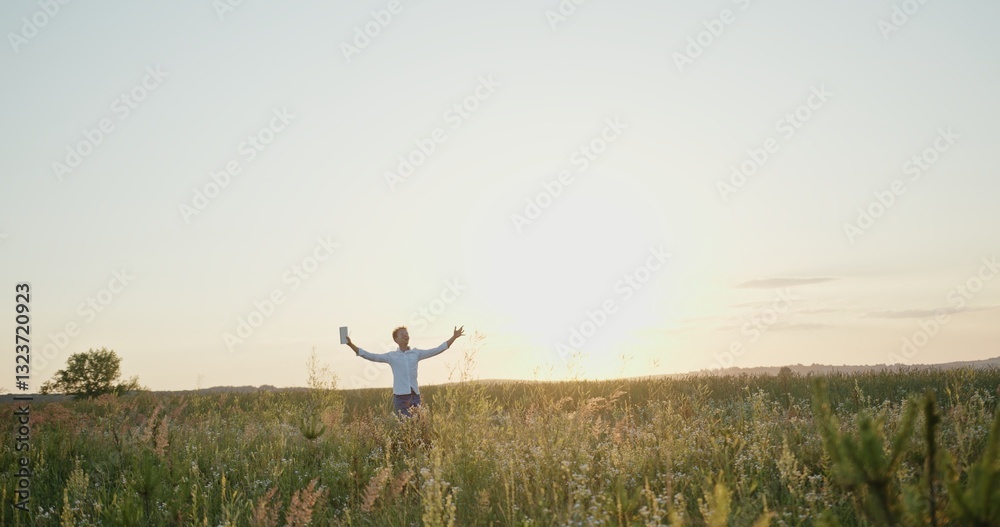 A Joyful Person Embracing the Wonders of Nature While Enjoying the Beautiful Sunset A Joyful Person Embracing the Wonders of Nature While Enjoying the Beautiful Sunset